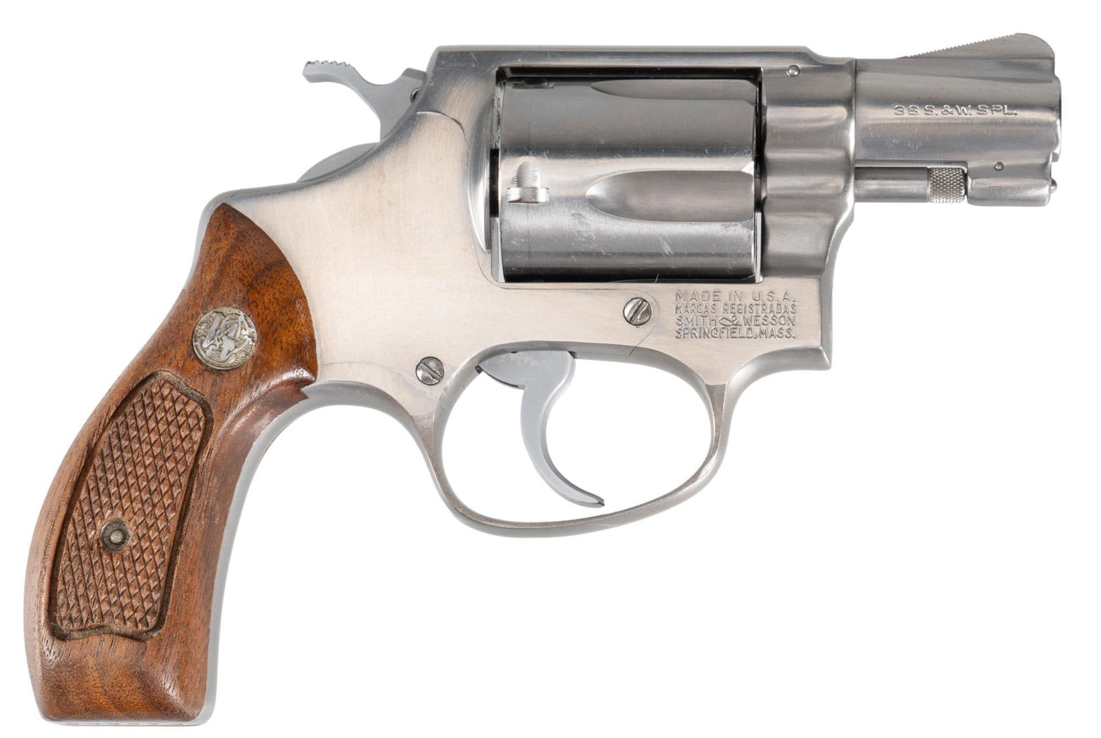 Smith & Wesson Model 60 Chief's Special 38 SPL Revolver: Serial: R48608 Manufacturer: Smith & Wesson Model: 60 Caliber: 38 S&W SPL Barrel Length: 1.875 in. OAL: 6.5 in. Condition: Good; wood grips have light handling marks; barrel, frame & cyli