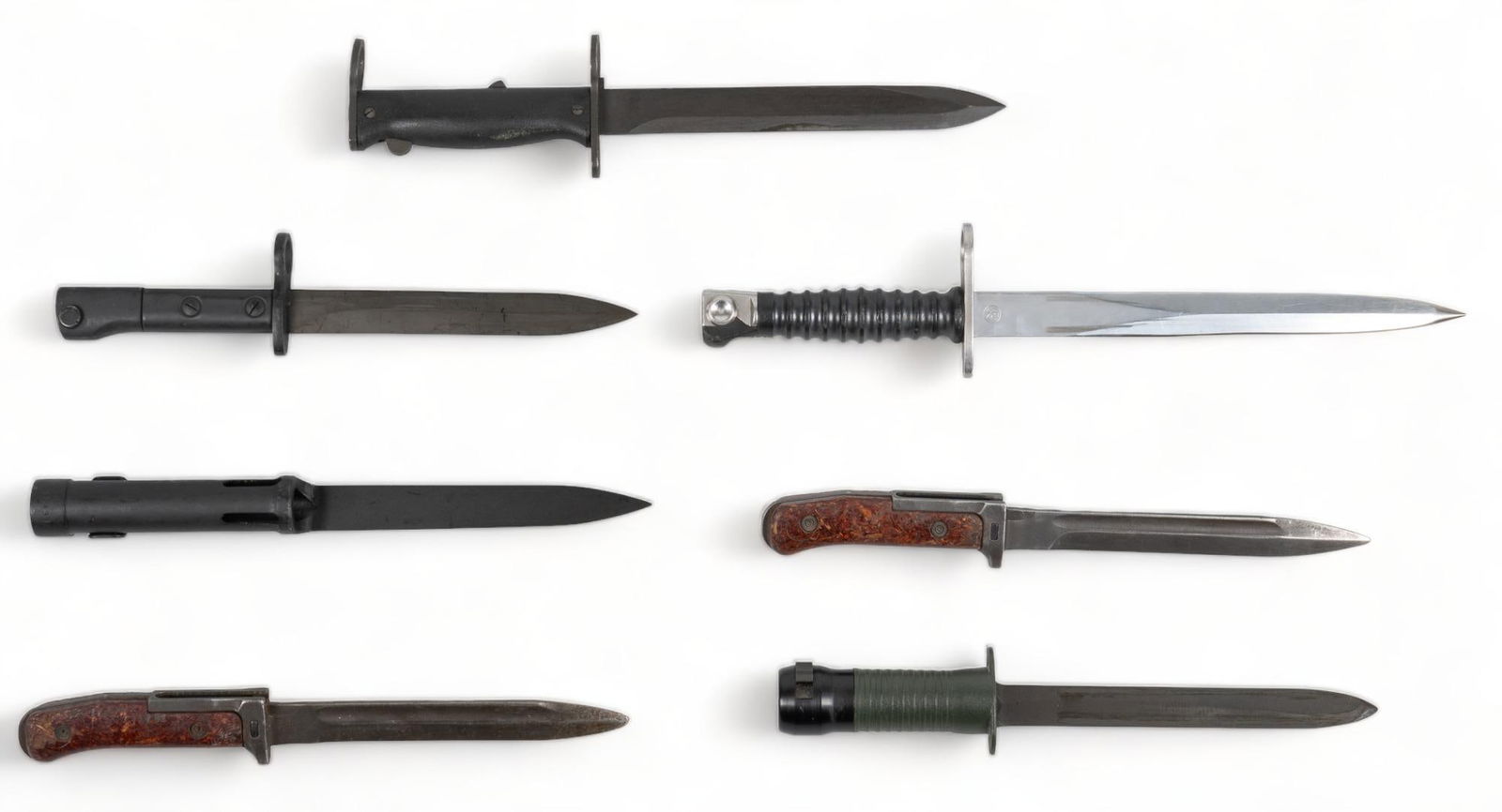 Collection of 7 Post-War European Bayonets: Manufacturer: (1) Victorinox; (2&3) FN; (4) MAT; (5&6) BRNO; (7) SIG Model: (1) Swiss M1957; (2) FAL Type C; (3) FN M1949; (4) M1958; (5&6) VZ-58; (7) 540/542 Longest Blade Length: (1) 9.2