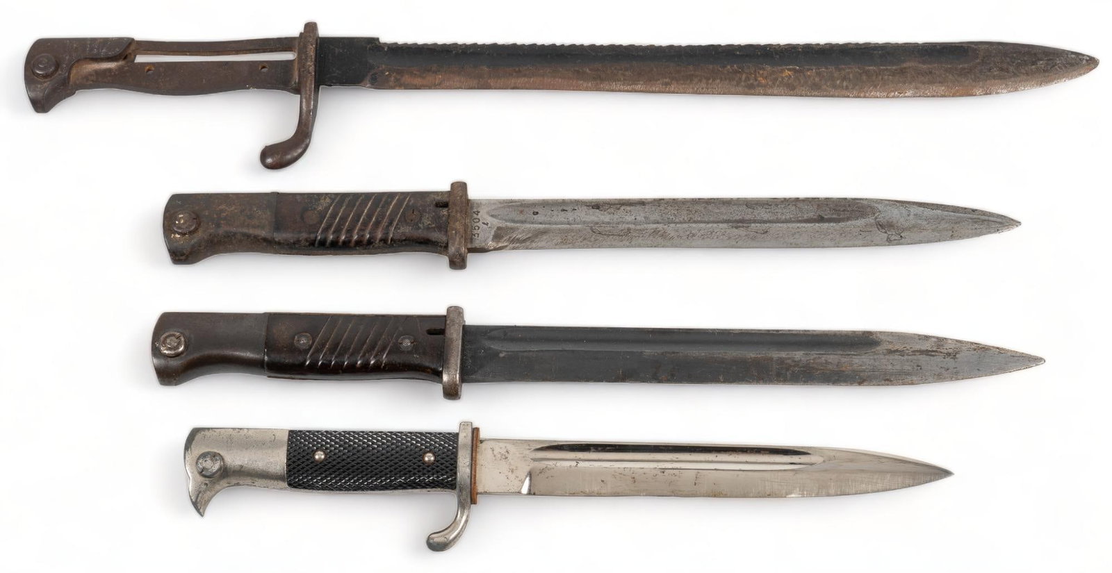 Collection of 4 German Bayonets: Includes: -(1 & 2) WWII K98 bayonets; (1) w/ scabbard & (2) w/ scabbard & frog; (1) Horster; (2) Durkopp -(3) WWI 1898/05 Sawback; Durkopp -(4) WWII K98 Dress bayonet; C. Gustav Spitzer; w