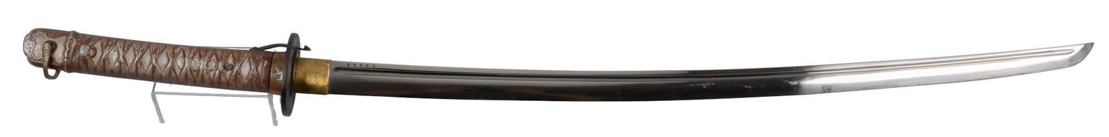 WWII Japanese Type 95 NCO Shin Gunto Katana W/ Saya: Manufacturer: Kokura Arsenal SN: 64225 Model: Type 95 NCO (Mid-term type) Blade Length: 26 in. Overall Length: 36.5 in. Condition: Good; aluminum Tsuka has moderate wear; blade has moderate wear w/ no