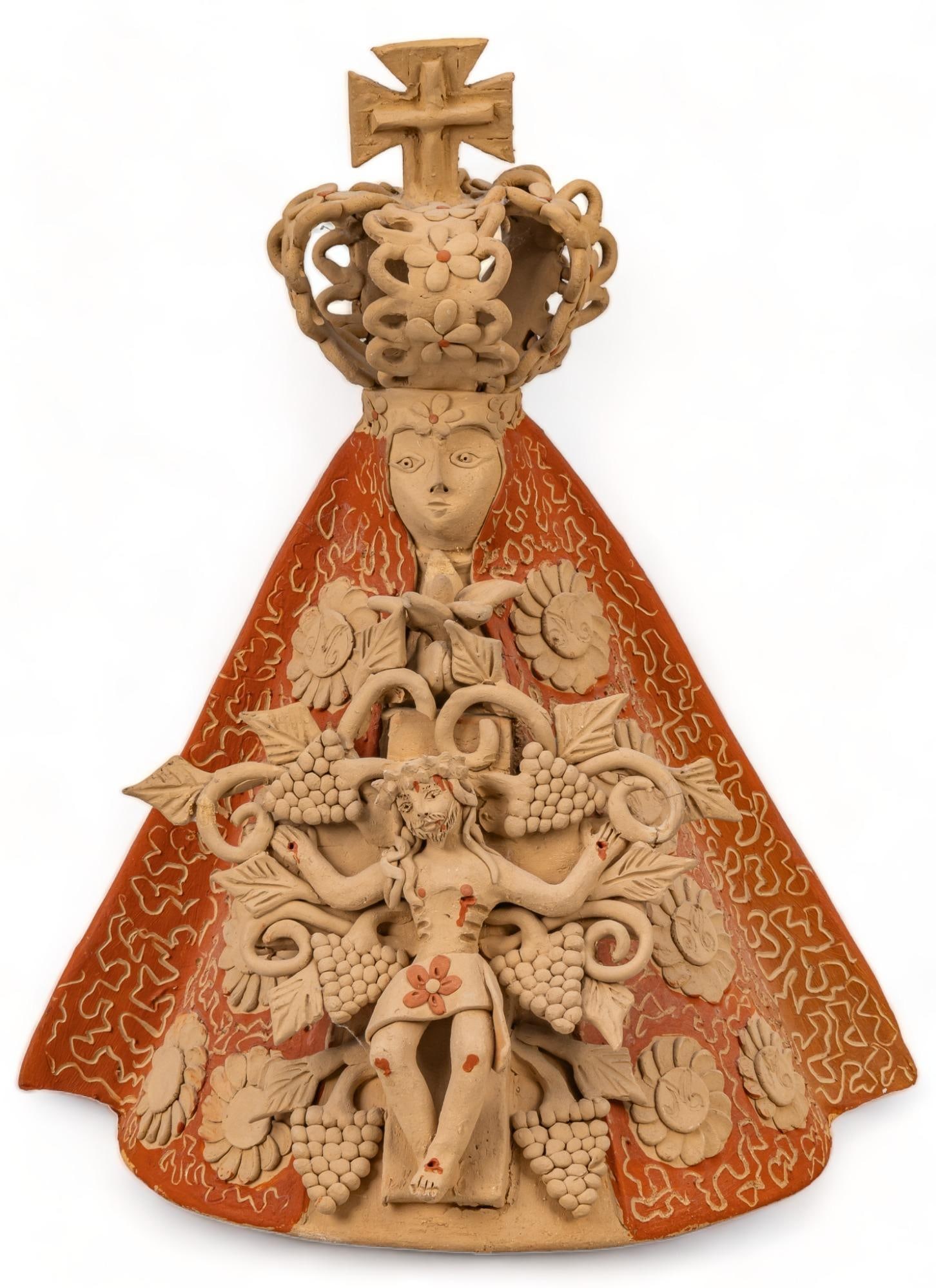Enedina Vasquez de la Cruz, Virgen de Soledad: Enedina Vasquez de la Cruz (Santa Maria Atzompa, Oaxaca), Virgen de Soledad (Our Lady of Solitude), modeled ceramic, unglazed, featuring front applique of crucifix, signed height 12 in. x width 10 i