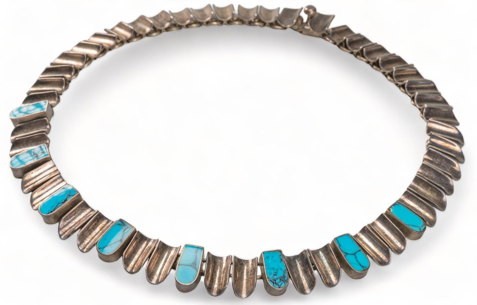 Sterling Silver and Turquoise Inlay Mexican Nail Chain Collar: Sterling silver and turquoise inlay Mexican nail chain collar, marked length 17.25 in. 92.3 grams Provenance: Property from a San Antonio, Texas collection We happily provide seamless shipping service