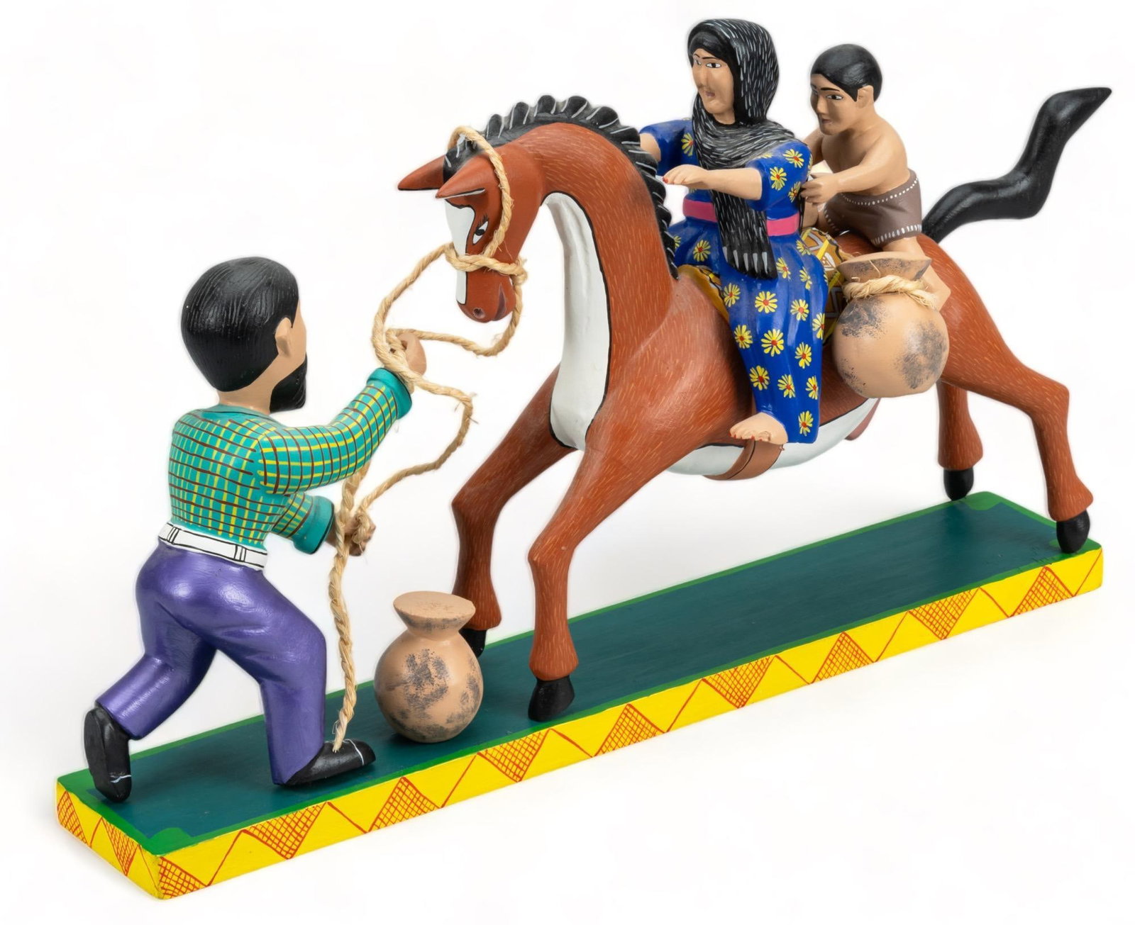 Agustin Cruz Tinoco, Rearing Horse: Agustine Cruz Tinoco (San Agustin de las Juntas, Oaxaca), carved folk art figure, depicting a man calming a rearing horse Provenance: Property from a home in the Alamo Heights neighborhood of San Anto