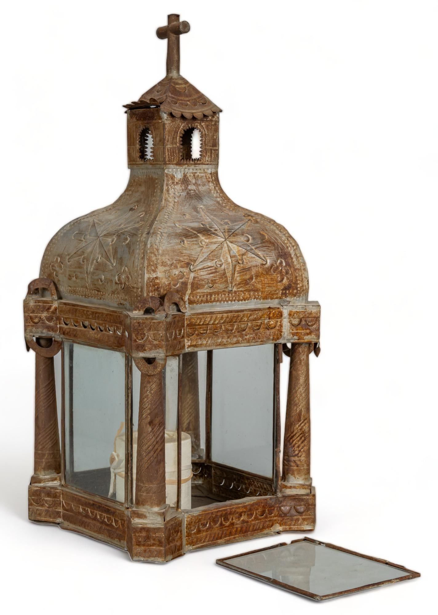 Punched Tin Church Lantern: Punched tin lantern in the shape of church, with glass paneled sides, punched and tooled tin frame, featuring architectural motifs, housing one candle height 23 in. x width 11 in. x depth 10 in. Prove