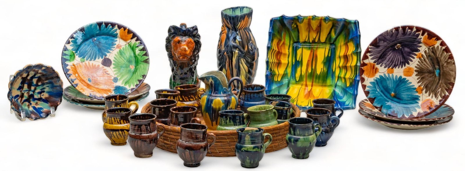 Collection of Oaxacan Dripware: Collection of Oaxacan dripware, with polychrome glaze, to include vases, plates, a coffee mug set height 11 in. x width 10 in. x depth 5 in. Provenance: Property from the life-long Mexican folk art co