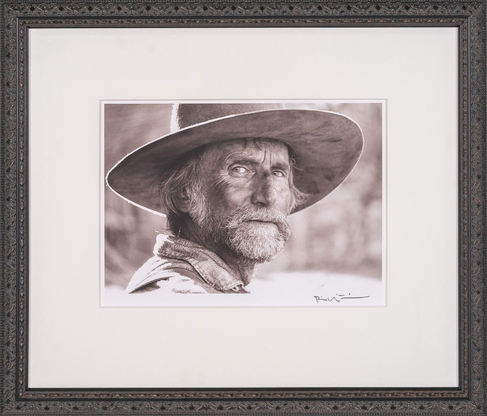 Pea Eye Parker, Lonesome Dove Signed Bill Wittliff Photograph: Bill Wittliff (1940-2019, USA) 1988 photograph of Timothy Scott as Pea Eye Parker from the "Lonesome Dove" television miniseries (1989), framed and matted by John Scott (Austin, Texas) under m