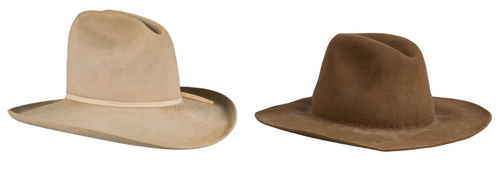 (2) Cowboy Hats from Lonesome Dove: Two cowboy hats from the set of the "Lonesome Dove" television miniseries (1989), including one dark brown example made by Texas Hatters, marked "Especially for Vans Ramsey", who was the costume desig