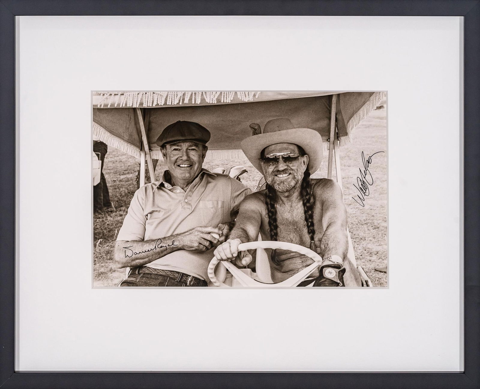 Darrell and Willie, Signed Bill Wittliff Photograph: Bill Wittliff (1940-2019, USA) Darrell and Willie, 20th century photograph of American football player, coach and music lover Darrell Royal and American country musician and actor Willie Nelson, frame