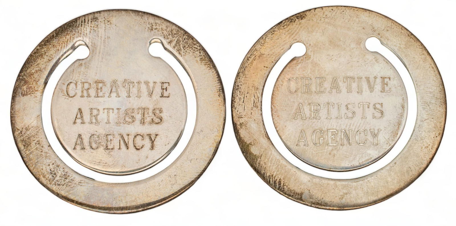 (2) Tiffany & Co. Bookmarks: Two Tiffany & Co. sterling silver bookmarks, presented as awards to new members of The Creative Artist's Agency, Inc. (California), marked, accompanied by two welcoming message cards, and one