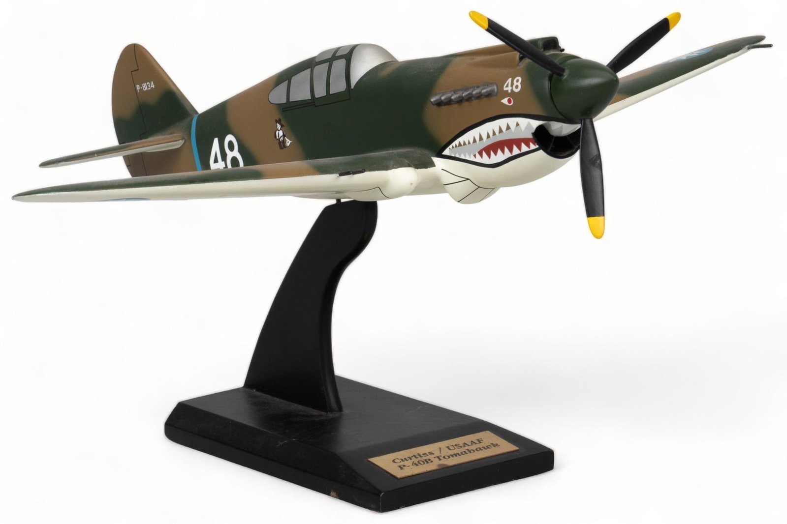 Curtis / USAAF P-40B Tomahawk Model Plane: Model airplane, Curtiss / USAAF P-40B Tomahawk, with base, with metal plaque height 11 in. x width 18 in. x depth 15 in. Provenance: Property from the personal estate collection of noted photographer 