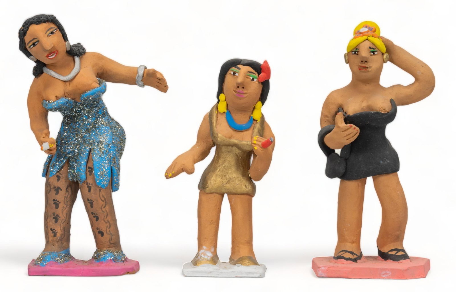 Josefina Aguilar, (3) Dancing Munecas: Josefina Aguilar (Oaxaca, Mexico, b. 1945), (3) dancing prostitute munecas, ceramic figurines, hand-molded and painted, all signed height 5.5 in. x width 3.25 in. x depth 2 in. / tallest Provenance: P