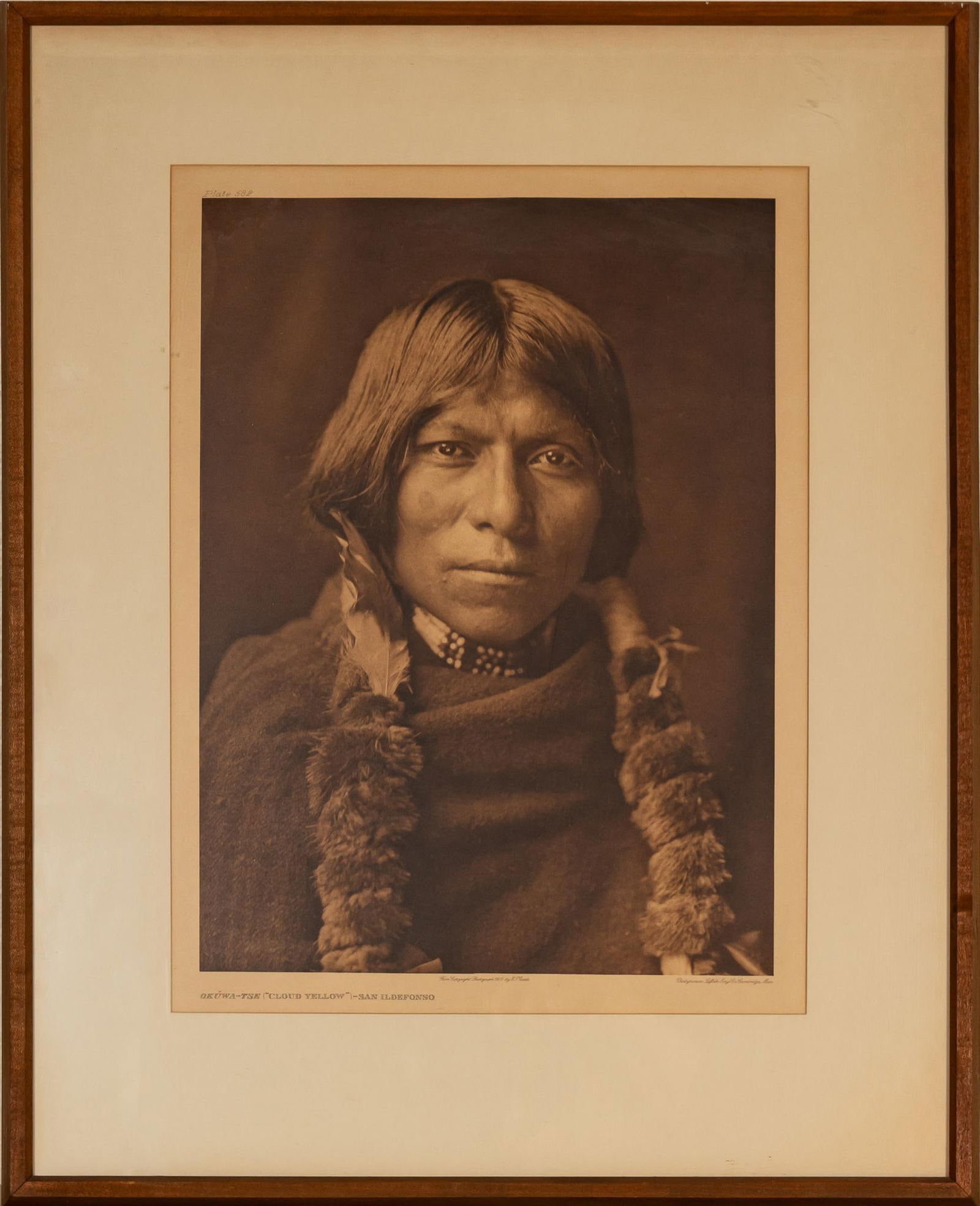 E.S. Curtis, Okuwa-tse - San Ildefonso Photogravure: Edward Sherriff Curtis (1868-1952, USA) Okuwatse, San Ildefonso, photogravure depicting Native American tribe member sight: 17 x 12.75 in., frame: 24 x 19.5 in. Provenance: Property from the persona