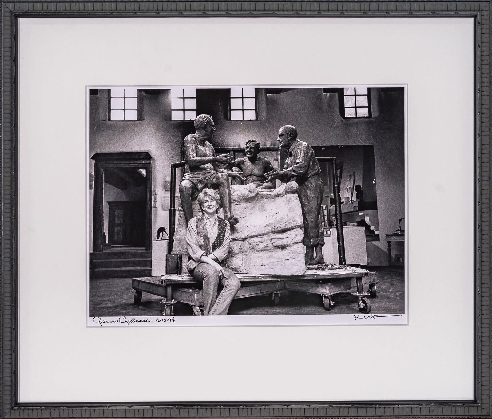 Glenna Goodacre Double Signed Bill Wittliff Photograph: Bill Wittliff (1940-2019, USA) Glenna Goodacre, 1994 photograph of American sculptor Glenna Goodacre (1939 - 2020, USA) in her studio, framed and matted by John Scott (Austin, Texas) under museum glas
