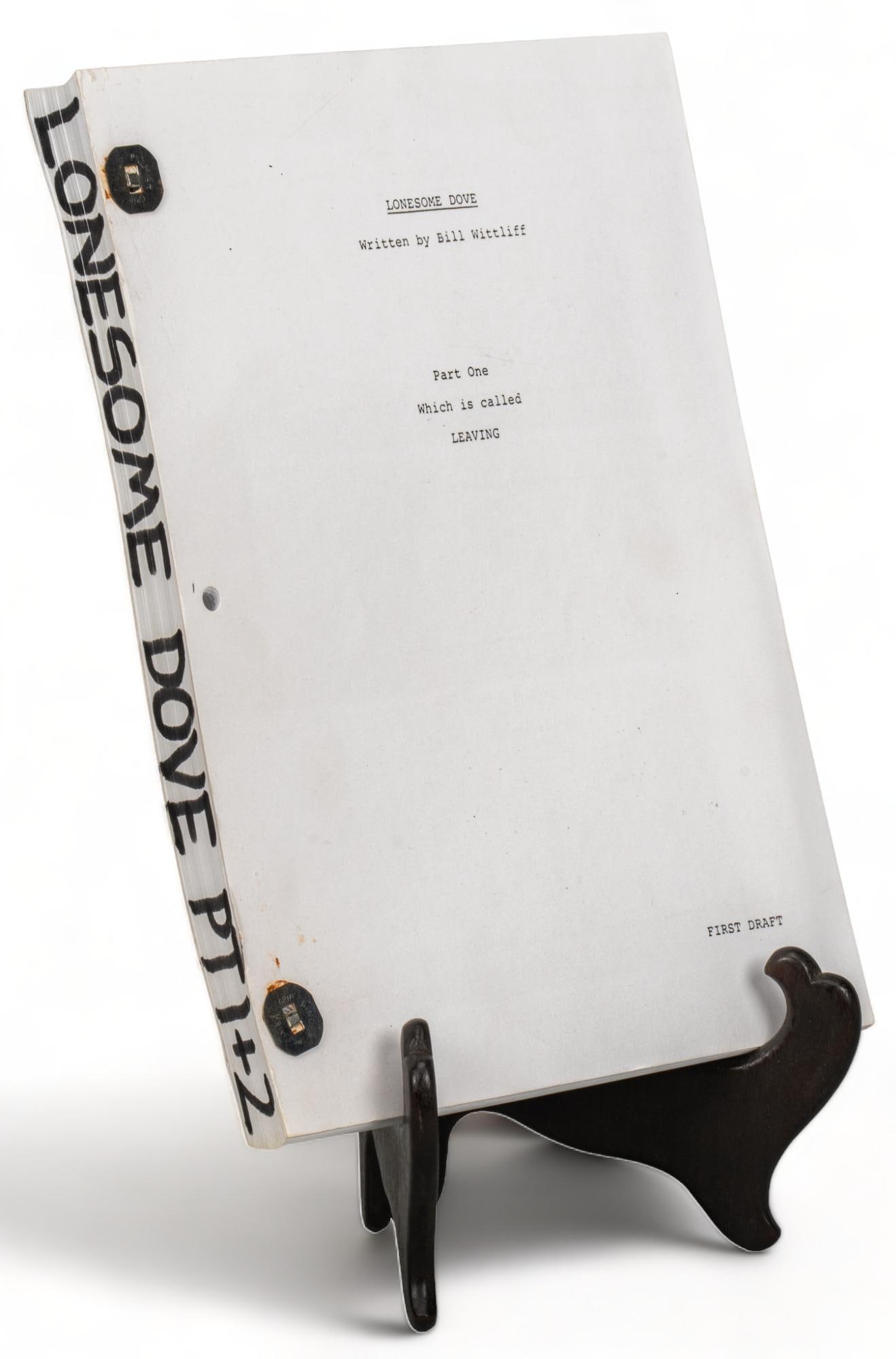 CBS Lonesome Dove Screenplay, Bill Wittliff: Copy of the first draft of the 1989 CBS Lonesome Dove television miniseries screenplay by Bill Wittliff, parts one and two, hole punched and bound with two brads Provenance: Property from a Bulverde,
