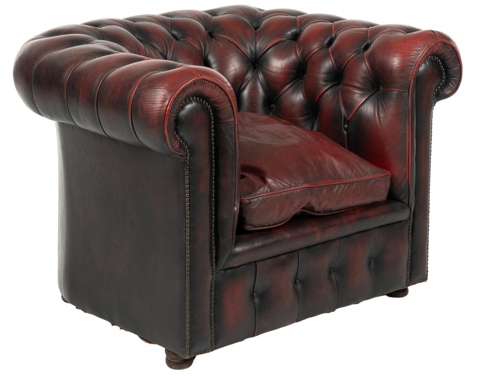 Oxblood Chesterfield Tub Chair: Chesterfield tufted tub chair, scrolled arms, cushion, oxblood, raised on bun feet height 29 in. x width 41 in. x depth 33 in. We happily provide seamless shipping services on everything we sell. Plea