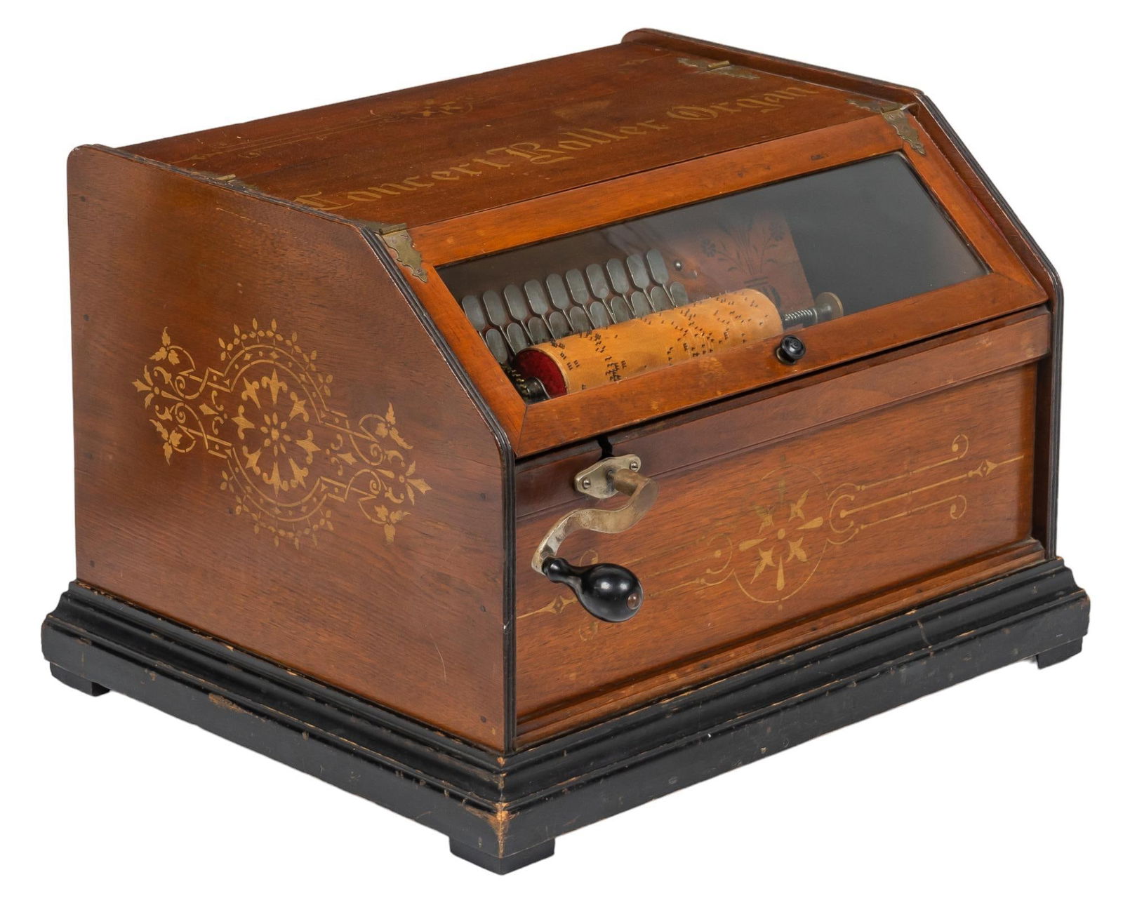 Antique Concert Roller Organ: Concert roller organ, wooden inlaid case with glazed door opens to keys and rollers, with crank, late 19th century height 12 in. x width 17.5 in. x depth 14 in. Provenance: Property from a Frederick
