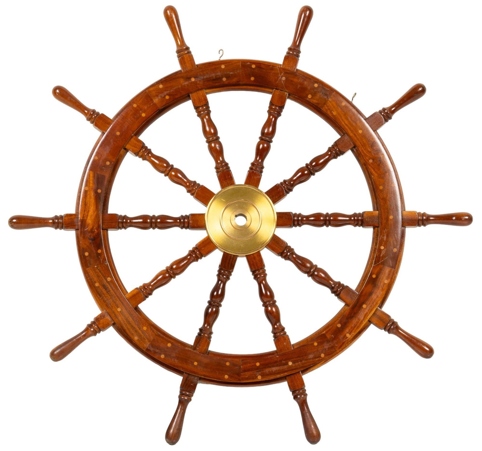 Wooden Ship's Wheel: Decorative wooden ship's wheel, 10 spokes, brass center, with hanging hardware height 45 in. x width 45 in. x depth 3 in. Provenance: Property from a San Antonio, Texas collection We happily provi