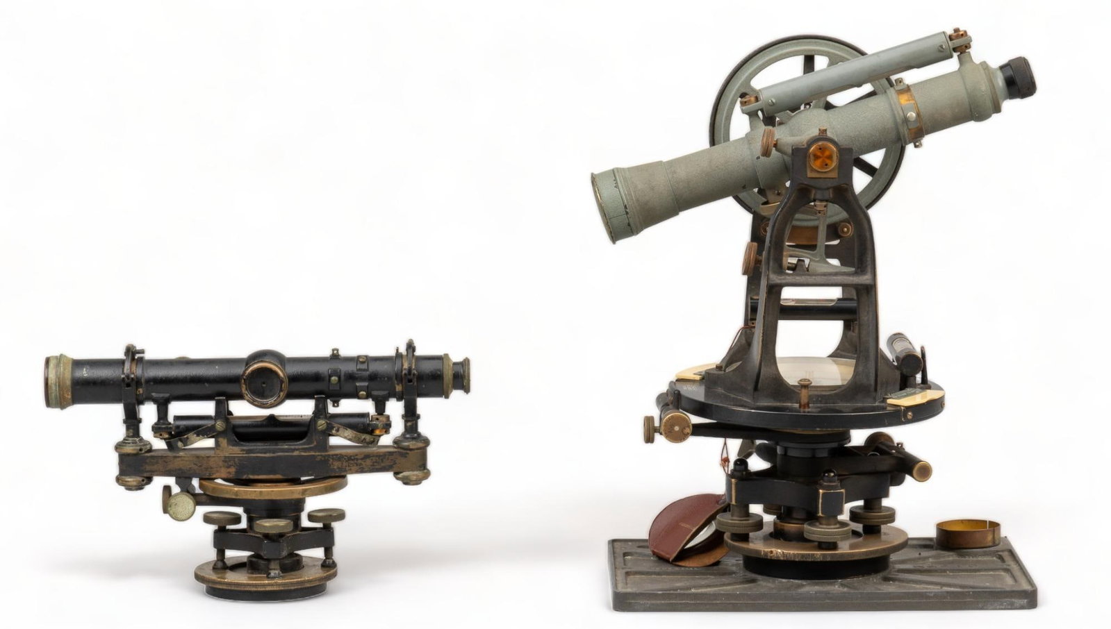 (2) Vintage Military Surveryors Equipment: (2) Vintage military surveyors devices, including one scope marked " Warren Knight Co." and one Keuffel & Esser transit scope height 16 in. x width 9 in. x depth 13.5 in. / tallest Provena