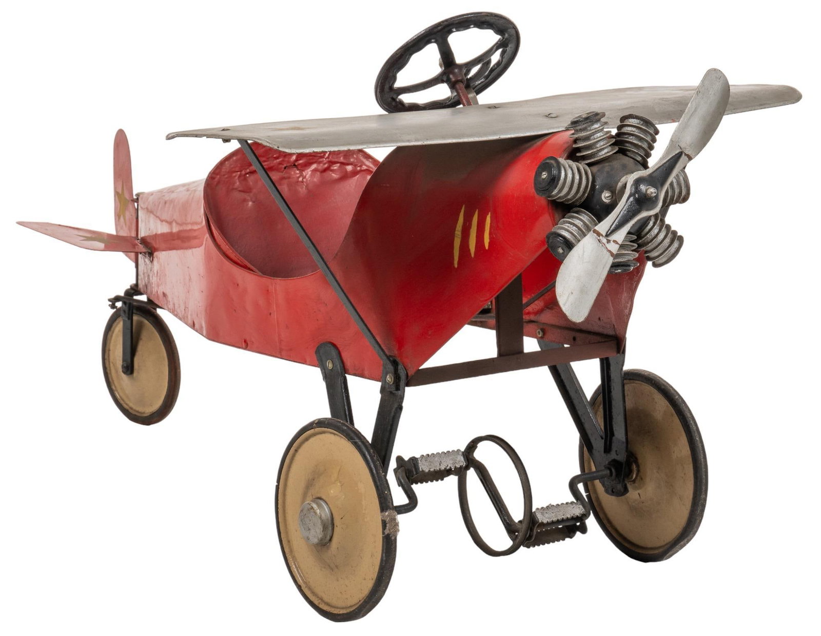 Vintage Pedal Airplane: Vintage children's pedal airplane, with tin frame, painted star accents height 26 in. x width 30 in. x depth 51 in. Provenance: Property from a Spring Branch, Texas collection We happily provide s