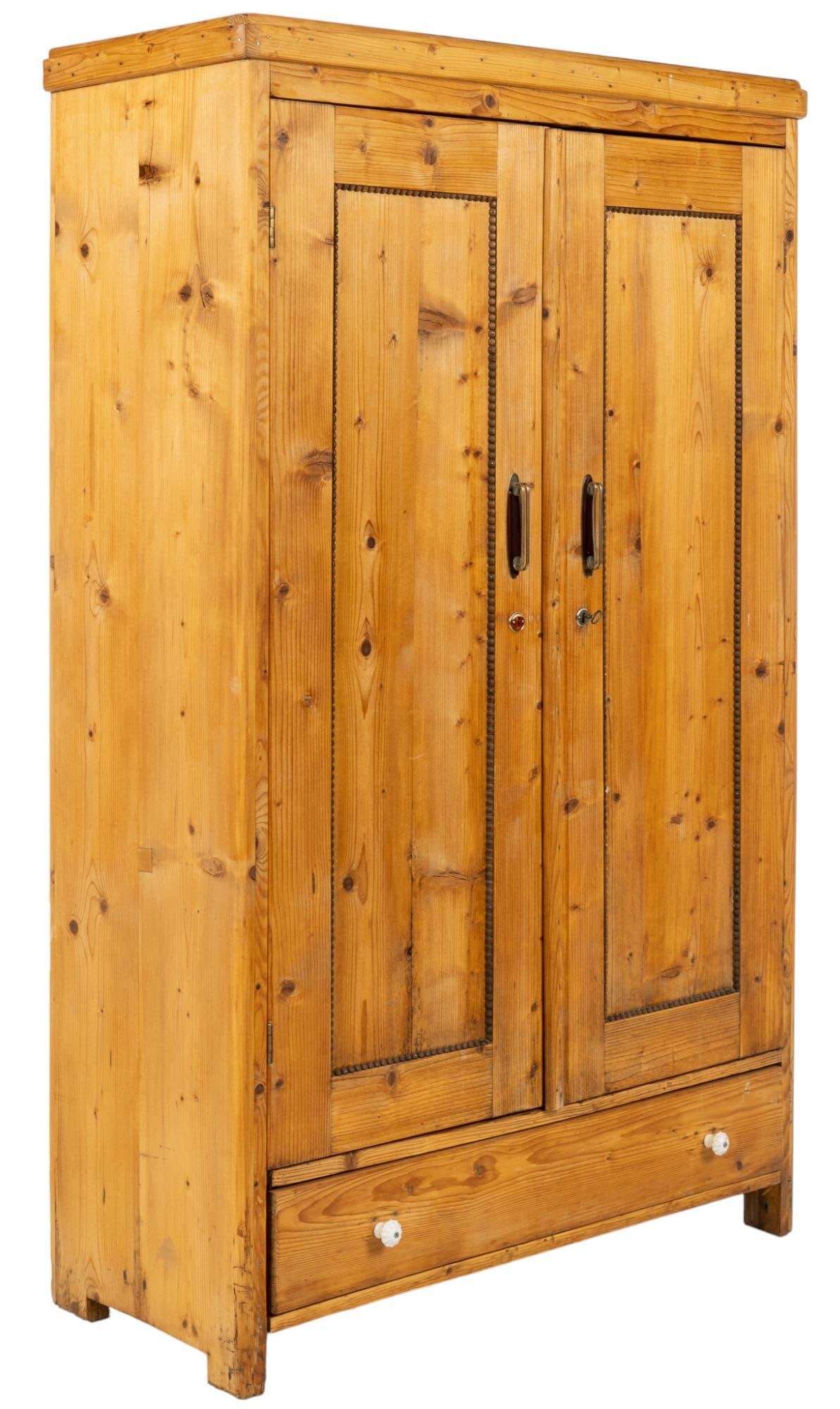 Farmhouse Wardrobe: Farmhouse style wardrobe, with two cabinet doors, opening to split interior, with left side having three storage shelves, and right said having open storage space, with hanging rack height 75 in. x wi