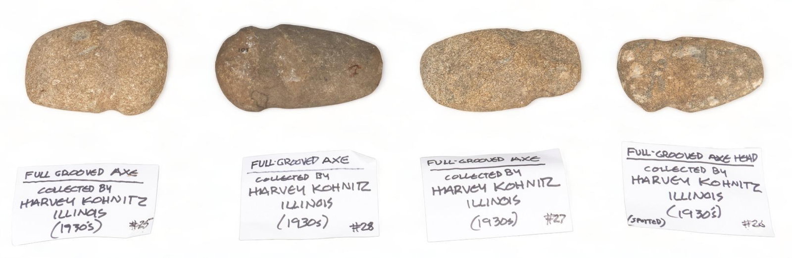 Collection of (4) Axe Heads: Collection of four archeological axe heads, said to have been collected in 1930's by prominent San Antonio amateur archeologist, Harvey Kohnitz height 2 in. x width 5.5 in. x depth 3.25 in. / larg