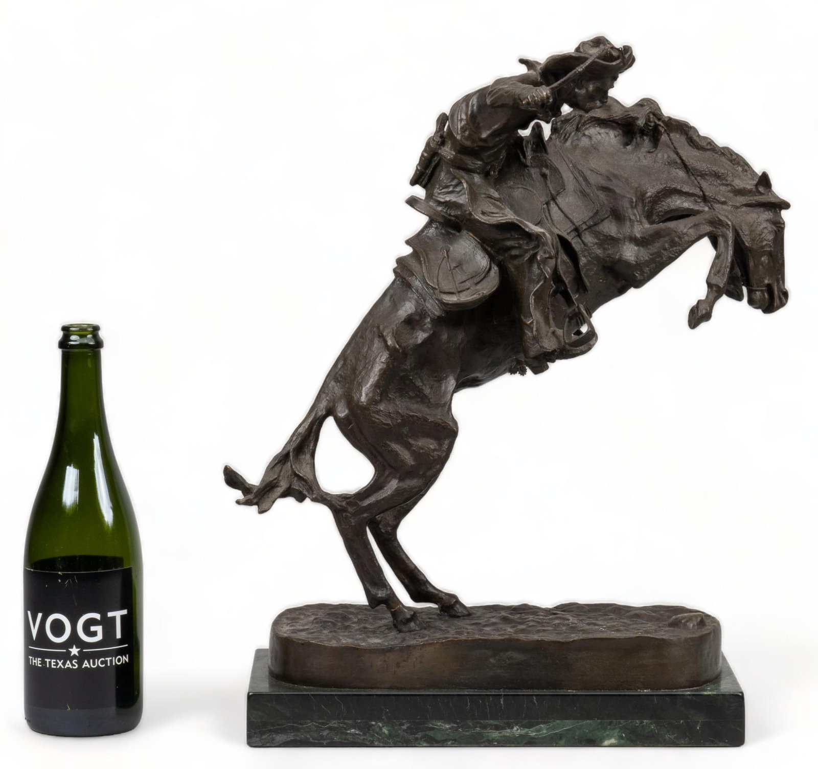 Frederic Remington, "Bronco Buster": Frederic Remington (Canton, New York, 1861-1909), "Bronco Buster", bronze recast on green marble base height 20 in. x width 15 in. x depth 7 in. Provenance: Property from a San Antonio, Texas 