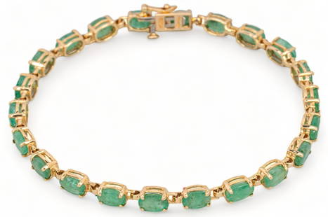 10K Gold Emerald Tennis Bracelet: 10K yellow gold and emerald tennis bracelet, twenty-two (22) four prong basket set faceted oval emeralds (approx 9 tcw), white gold press button tension clasp with safety, marked Includes