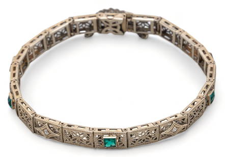 Art Deco Emerald and Diamond 14K Gold Filigree Bracelet: Art Deco emerald and diamond 14K white gold filigree bracelet, marked, circa 1920s length 7 in. total weight: 8.1 grams Provenance: Property from the estate of life-long antique jewelry