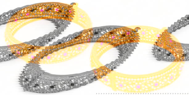 (2) 22K Gold Seed Pearl and Ruby Screw Hinge Bangles: Two (2) seed pearl and ruby 22K yellow gold screw hinge bangle bracelets, floral design, clear crystal border, electronically tested circumference 7.5 in. total weight: 60.3 grams Provenance: