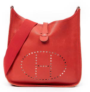 Hermes Evelyne Shoulder Bag: Hermes Evelyne shoulder bag of rouge epsom calfskin leather, with perforated H design, and silver toned metal hardware; marked H in Square (2004), includes canvas strap 13 in. x 12 in. x 3 in. Condi