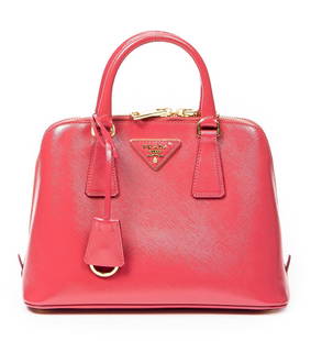 Prada Small Promenade Bag Shoulder Bag: Prada Small Promenade shoulder bag of fuchsia pink Saffiano Vernis calfskin leather with fuchsia pink leather handles, and gold tone hardware; marked BL0838, includes shoulder strap, card, clochette,