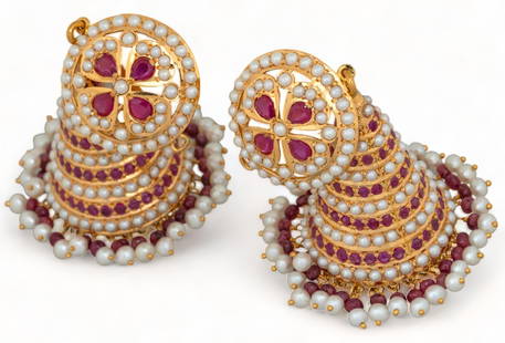 22K Gold Ruby and Seed Pearl Chandelier Dangle Jhumki Earrings: Pair of 22K yellow gold ruby and seed pearl chandelier dangle Jhumki earrings, post backs, marked length 3 in. total weight: 49.6 grams Provenance: Property from a San Antonio, Texas corporate