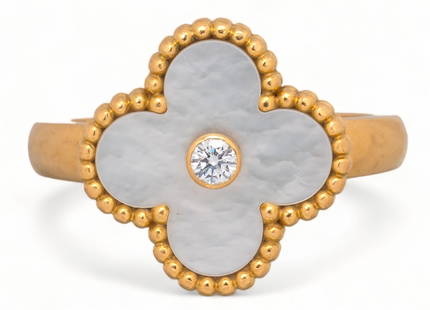 Van Cleef & Arpels Magic Alhambra 18K Gold Ring: Van Cleef &amp; Arpels vintage &#34;Magic Alhambra&#34; 18K gold ring, set with mother of pearl top and 0.06 ct diamond, VVS clarity and F-G color, marked  size: 6.5 total weight: 6.4 grams  Provenanc