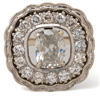 14K Gold Floating Halo Diamond Ring: Handmade floating halo 14K white gold diamond (1.9 tcw) ring, prong set central oval brilliant cut diamond (approx. 1.18 ct, clarity 1-1, color H-I), prong set around central diamond are sixteen (16)
