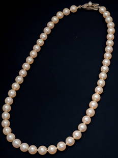 1960's Mikimoto Pearl Necklace: 1960's Mikimoto 17" pearl necklace, forty-nine (49) round Akoya cultured pearls hand strung on silk thread, sterling pearl clasp, marked Includes July 2021 appraisal by Boreggo Fine Jewelry,