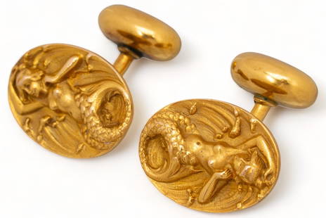 Handcast Mermaid 14K Yellow Gold Cuff-Links: Hand-cast mermaid 14K yellow gold cuff-links, oval, marked  length 18.5 mm. total weight: 7.8 grams  Provenance: Property from the estate of a former San Antonio, Texas banker  We happily provide seam