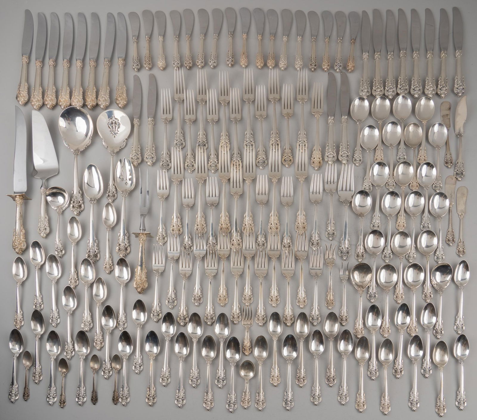 "Grande Baroque" Wallace Sterling Silver Flatware Set: "Grande Baroque" by Wallace Silversmiths sterling silver flatware set of 160 pc, service for 12, no monogram or removal Includes: 8 dinner knives 9 7/8 in. 12 place knives 9 in. 8 dinner fork