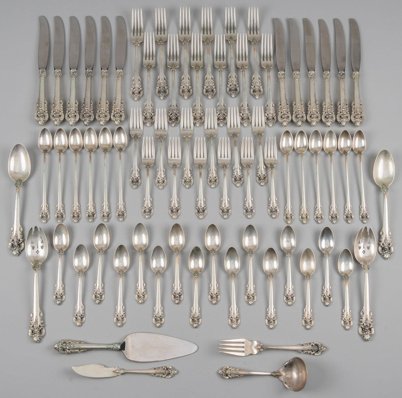 "Grand Baroque" Wallace Sterling Silver Flatware Set: "Grande Baroque" by Wallace Silversmiths sterling silver flatware set of 72 pc, service for 12; no monogram or removal Includes: 12 dinner knives 9 3/4 in. 12 dinner forks 8 in. 12 salad for
