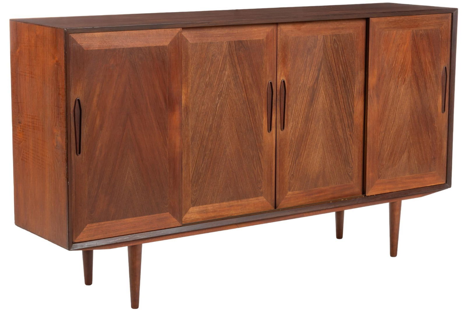 Danish Mid-Century Cocktail Cabinet: Danish Mid-Century cocktail cabinet, double sliding doors open to central mirrored bar featuring shelving and sliding drawers, flanked by two sliding doors opening to shelving, supported by tapered le