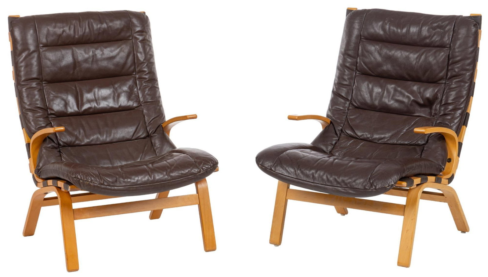 Pair of Danish Mid-Century Lounge Chairs: Pair of Danish Mid-Century lounge chairs, after "Miljo" chair, designed for Farstrup (Denmark) with ribbed brown leather upholstery, supported on bentwood frame height 38 in. x width 25.5 in. 