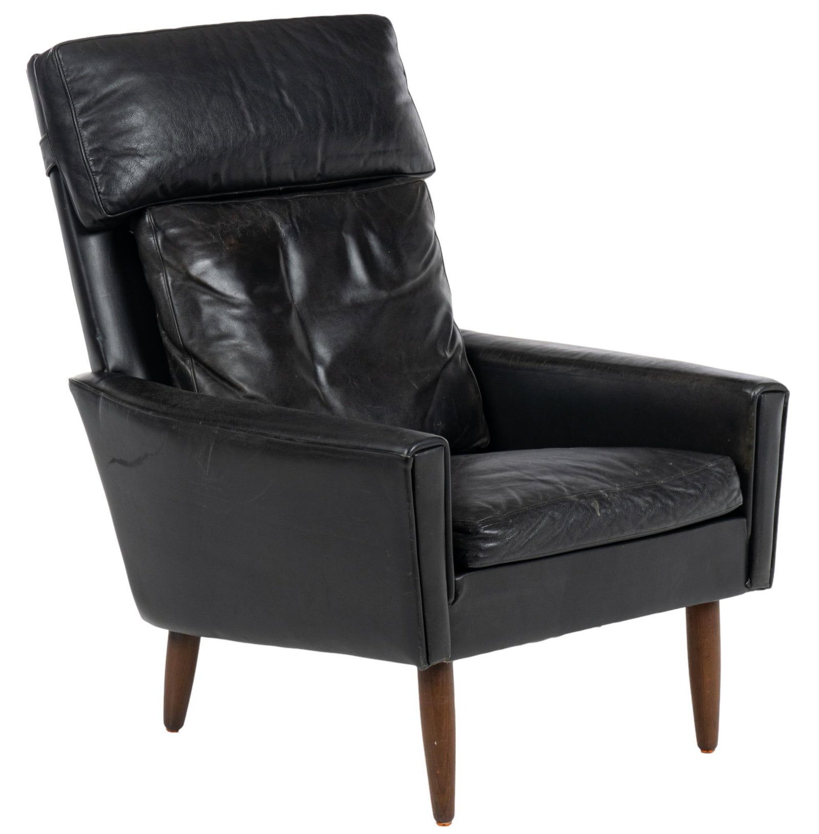 Danish Mid-Century Leather Armchair: Danish Mid-Century arm chair of black leather upholstery, with head, back, and seat cushion, on splayed pin legs height 40 in. x width 32 in. x depth 32 in. We happily provide seamless shipping servic
