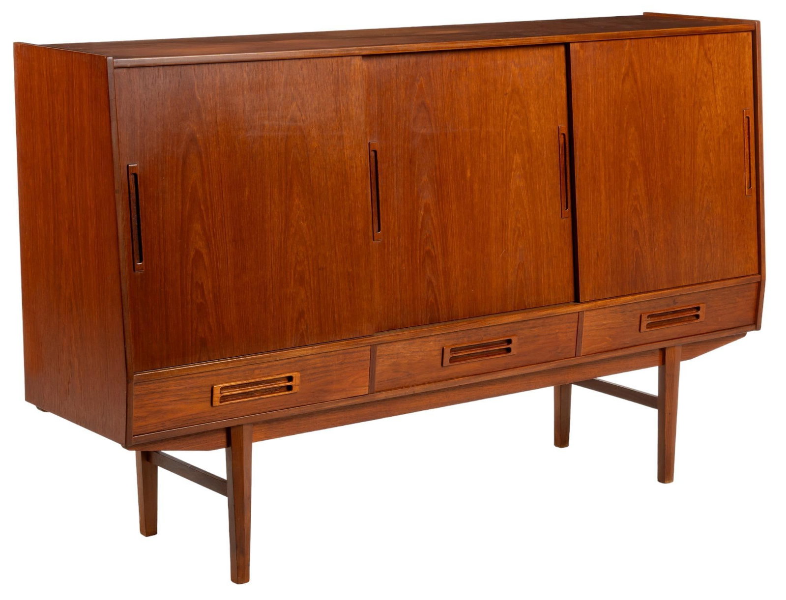 Danish Mid-Century Credenza: Danish Mid-Century credenza / sideboard with three sliding wood doors with integrated pulls, with left and center compartments having shelved interiors, with right door opening to internal storage wit