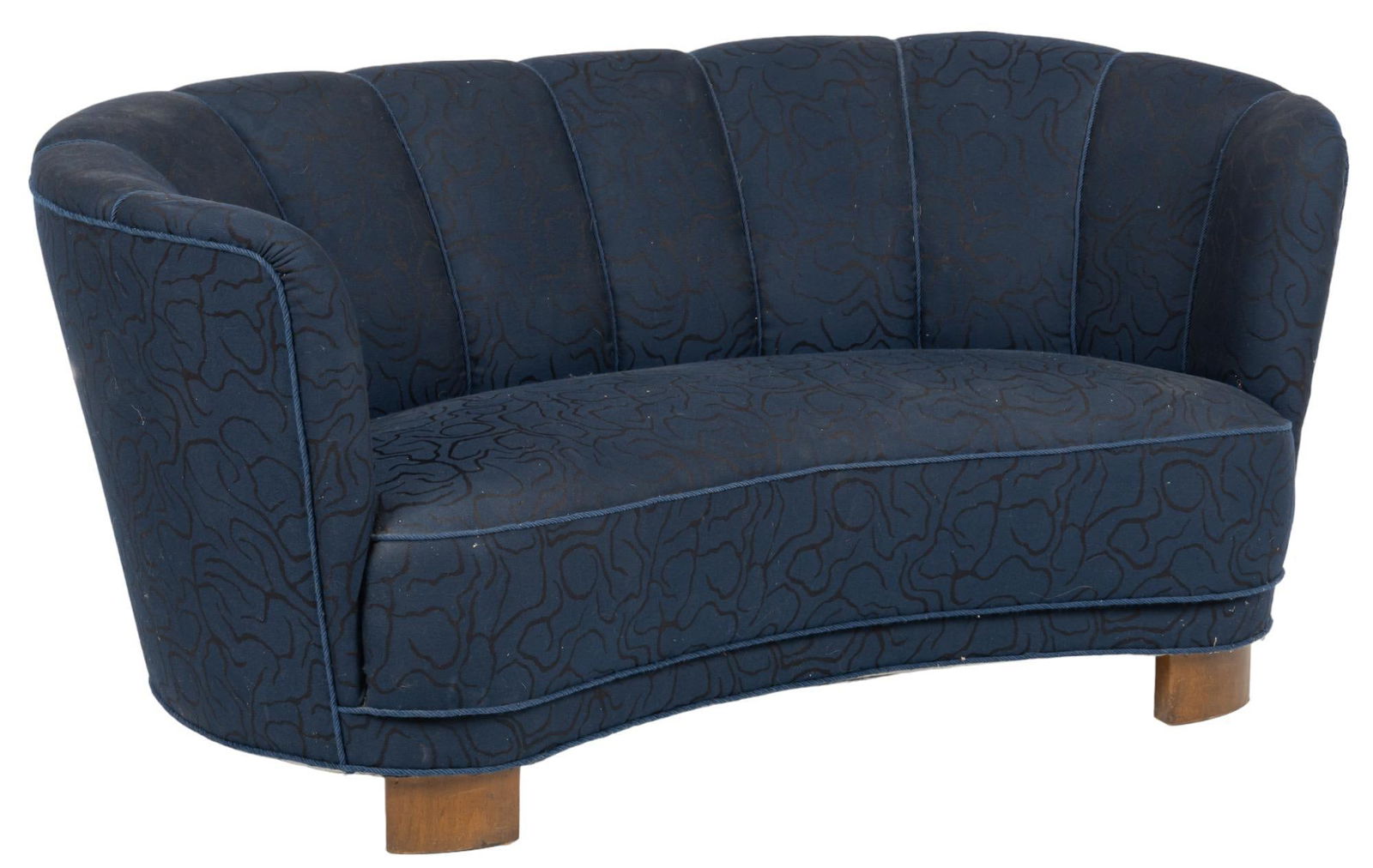 Danish Mid-Century Blue Love Seat: Danish Mid-Century curved love seat, of blue cushioned upholstery with black organic design work, supported on curved block legs height 29 in. x width 63 in. x depth 32 in. We happily provide seam