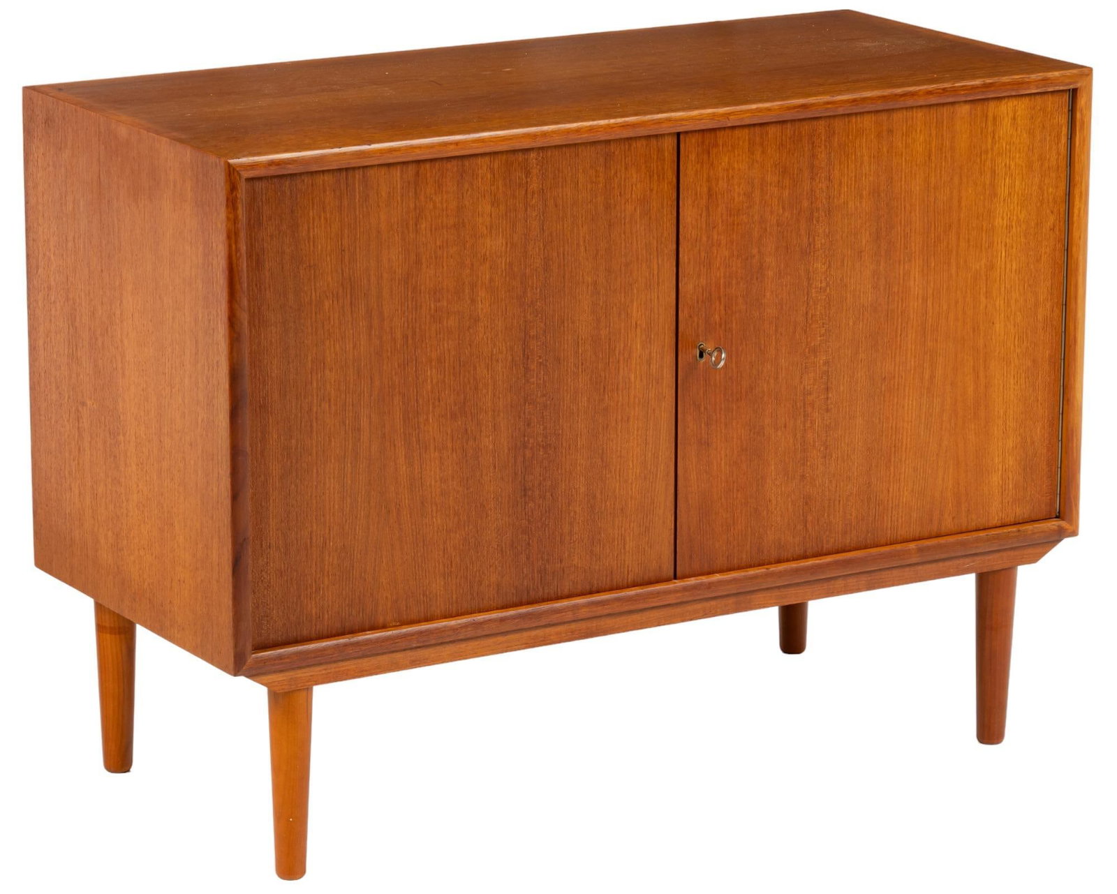 WK Mobel Mid-Century Credenza: WK Mobel (Denmark) Mid-Century small credenza, with pair of doors opening to shelved interior storage, supported on pin legs, marked on back, includes key height 29 in. x width 59.5 in. x depth 18 in.