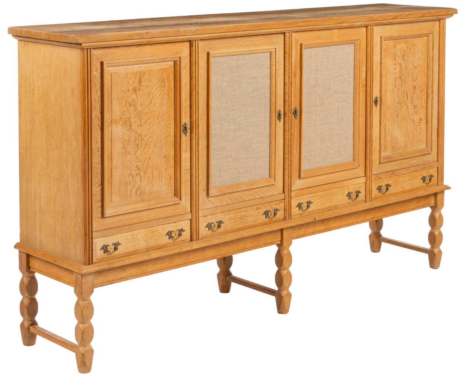 Henning Kjaernulf Style Credenza: Danish Mid-Century credenza / sideboard, in the style of Henning Kjaernulf, with thick top, above four cabinet doors, featuring two center doors with inlaid canvas panels, opening to shelved interior,