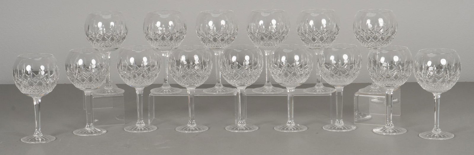 Set of (15) Waterford "Lismore" Balloon Wine Goblets: Set of fifteen crystal wine goblets, by Waterford, in the "Lismore" pattern, featuring oversize balloon bowls, marked Provenance: Property from the estate of a Seguin, Texas lady Shipping av