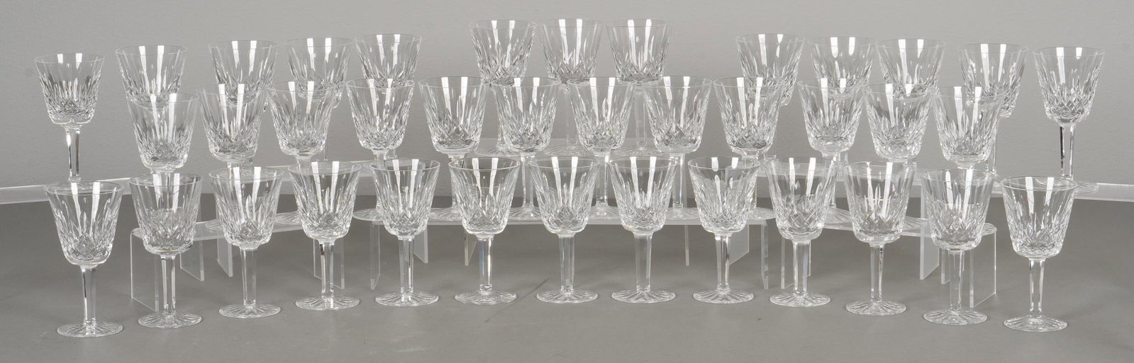Set of (38) Waterford "Lismore" Wine Glasses: Set of thirty-eight Waterford crystal wine glasses, in the "Lismore" pattern, marked on base height 6 in. x diameter 3 in. Provenance: Property from the estate of a Seguin, Texas lady Shipping