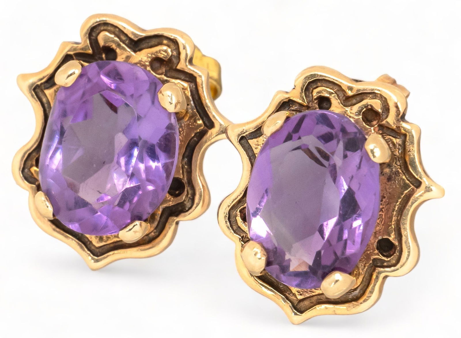 14K Gold Amethyst Black Enamel Studs: Amethyst 14K yellow gold black enamel studs, marked, circa 1880 length 14 mm. amethyst / length 10 mm. total weight: 4.3 grams Provenance: Property from the estate of life-long antique jewelry colle