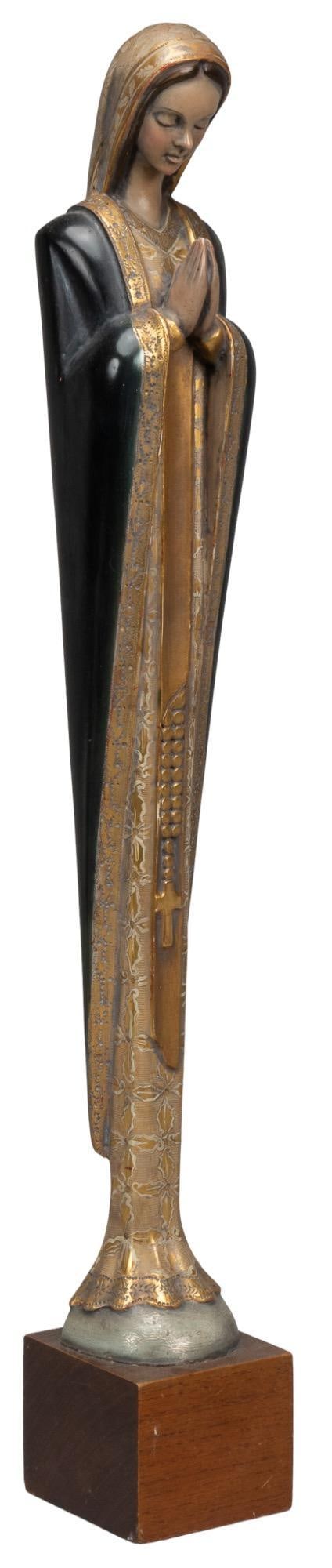 Virgin Mary Statuette: Hand-carved and painted wooden statuette of the Virgin Mary with rosary, atop continuous wooden base height 25 in. x width 3.5 in. x depth 3.5 in. Provenance: Property from a mansion in Mexico City, M