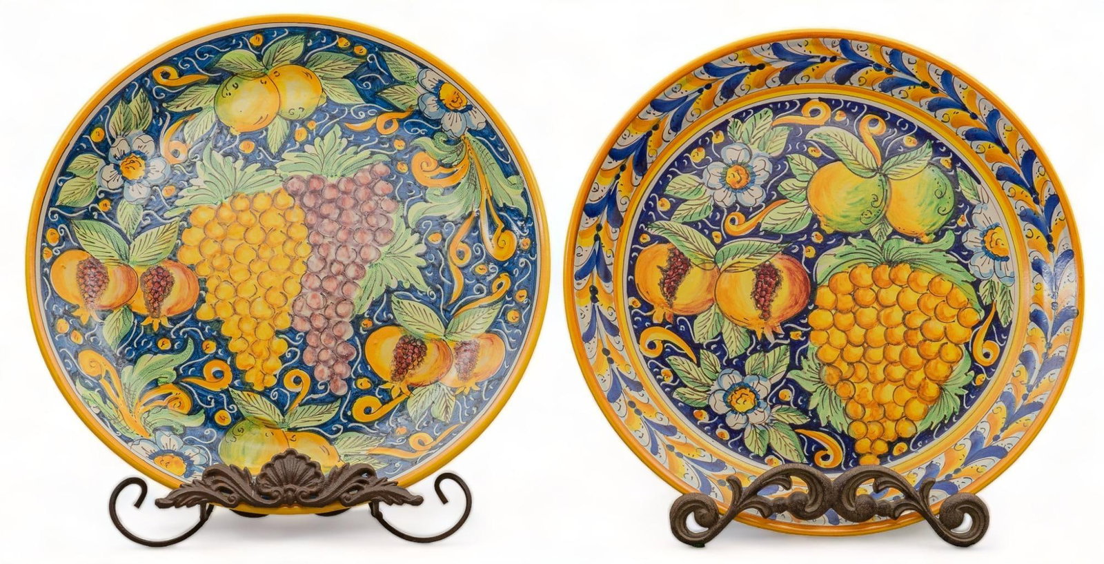 Pair of Italian Majolica Chargers: Pair of Italian Majolica chargers, glazed stoneware, with fruit motifs, signed E. Boria, marked Caltagirone (Sicily, Italy) diameter 17.5 in. x depth 2 in. / single plate Provenance: Formerly displaye